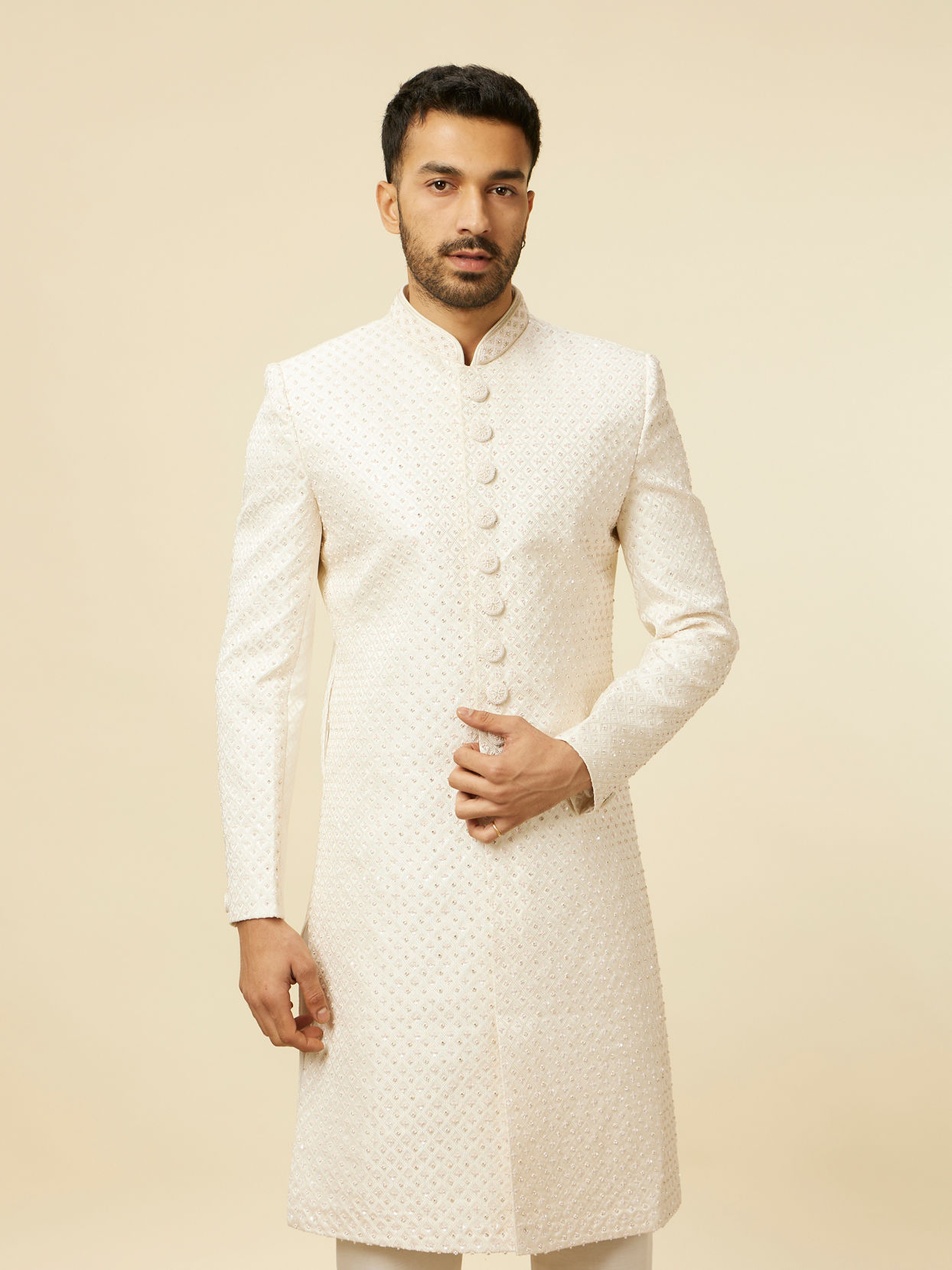 alt message - Manyavar Men Warm White Self-designed Sherwani Set image number 0